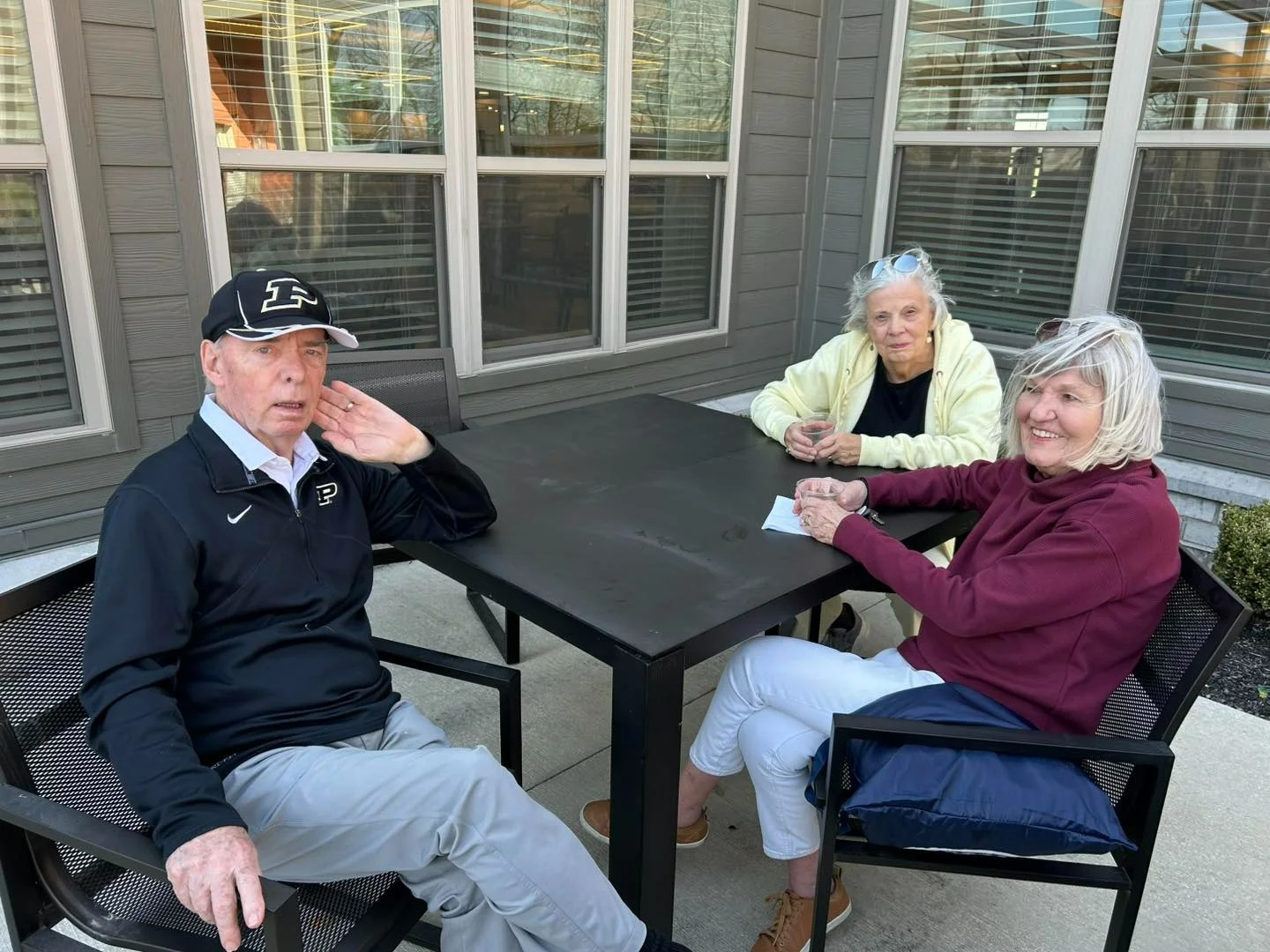 Astral at Auburn, senior living community offering independent living, assisted living, and memory care in Auburn, IN, residents enjoying the weather outside