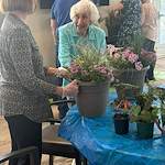 Westminster Village North Senior Living resident activity - planting flowers