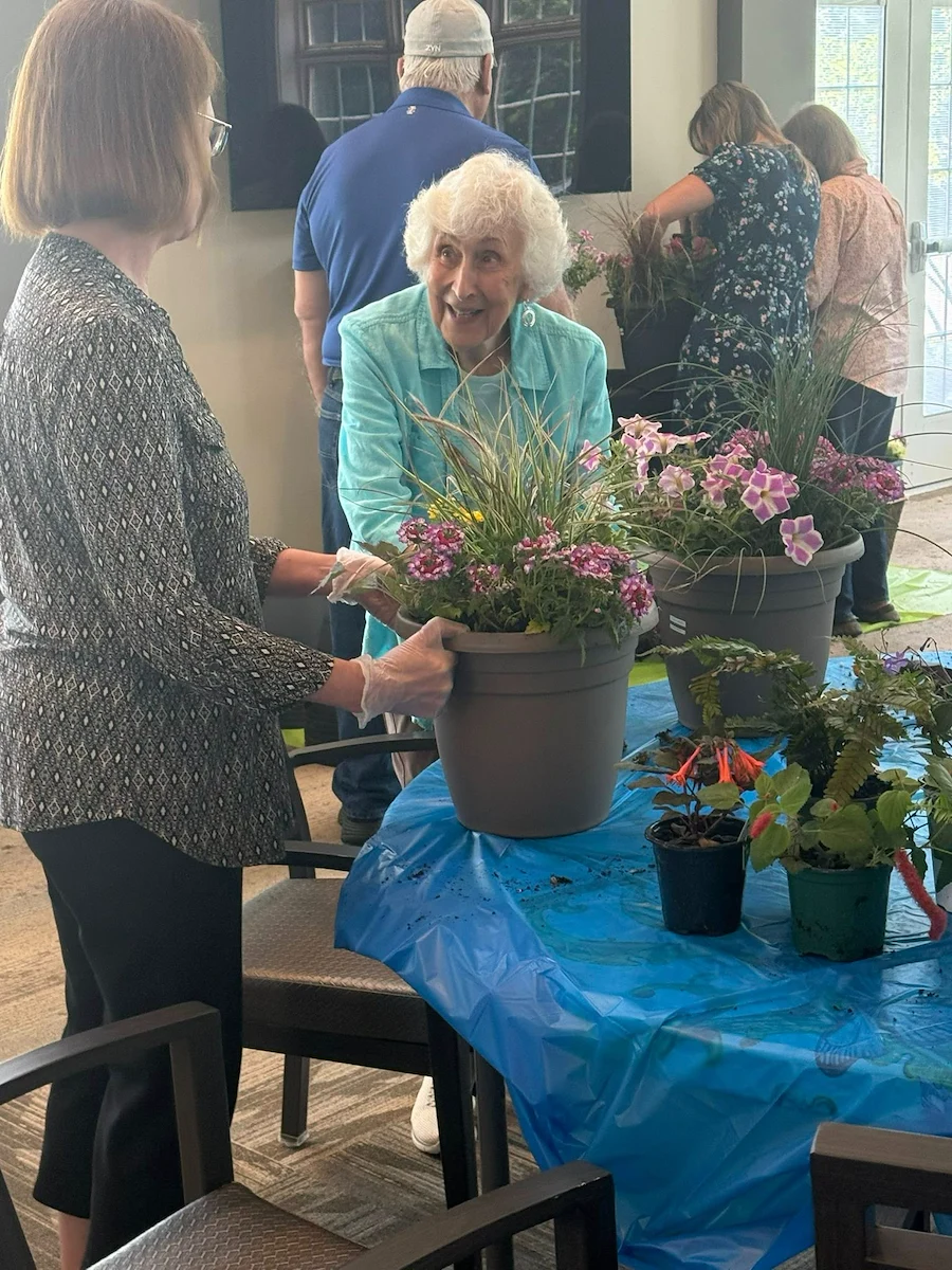 Westminster Village North Senior Living resident activity - planting flowers