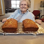 Hawthorne Woods by New Perspective in Washington, PA, smiling resident with treat