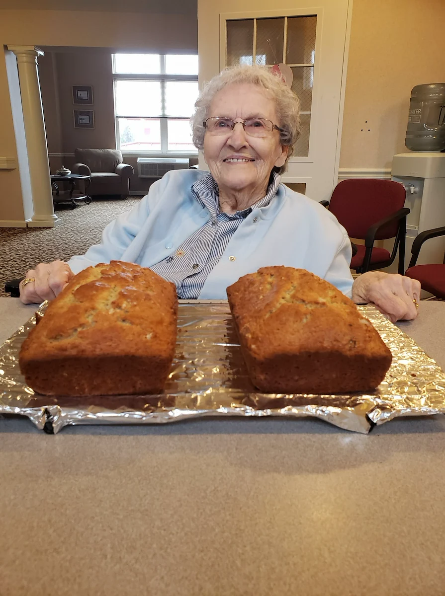 Hawthorne Woods by New Perspective in Washington, PA, smiling resident with treat