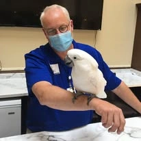 Ascension Living Via Christi Village Georgetown Senior Independent Living in Wichita, Kansas staff member holding a bird
