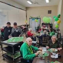 Avamere at South Hill senior living community offering assisted living and respite care in Spokane, WA, residents celebrating St. Patrick's Day