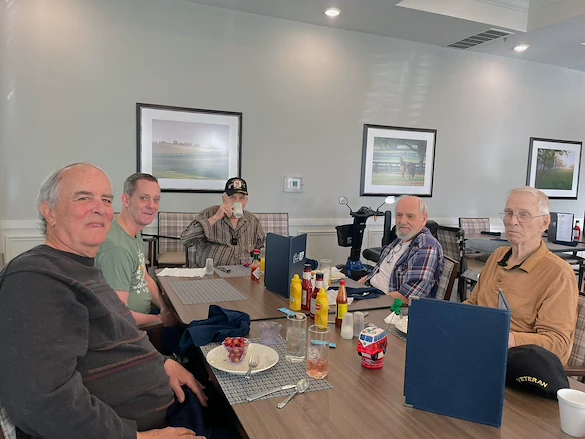 Calumet Trace - a Charter Senior Living Community residents enjoy dining together and socializing