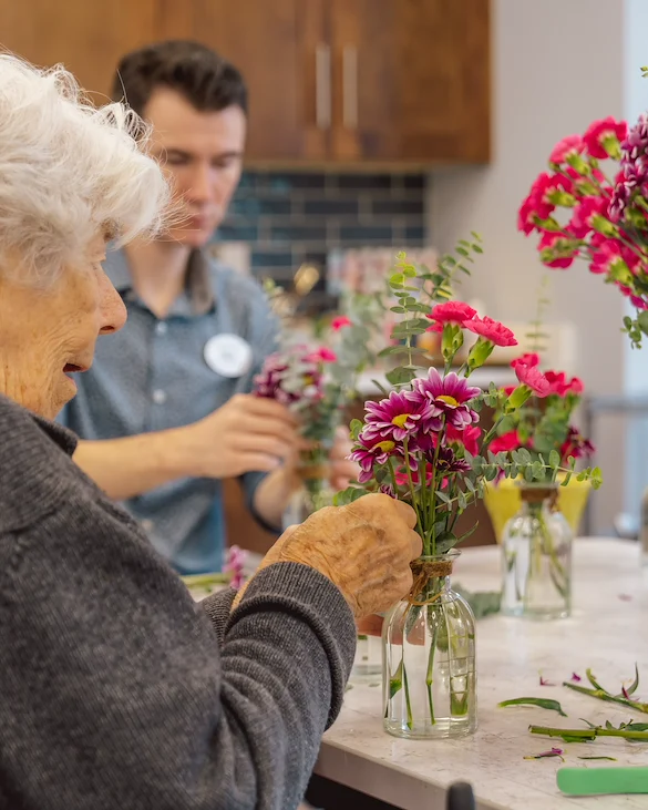 Fieldstone Memory Care of Bainbridge resident activity - arranging flowers