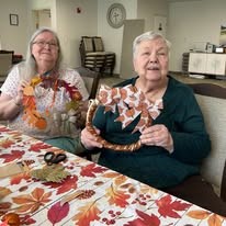Jordan Oaks Gracious Retirement Living Hawthorn Senior Independent Living in Cary, North Carolina residents doing a fall craft