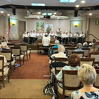 Chateau Bothell Landing in Bothell, WA, residents enjoy listening to singers