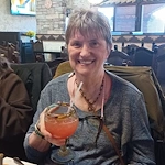 American House Dearborn Heights, senior living community offering independent living and respite care in Dearborn Heights, MI, resident enjoying a drink