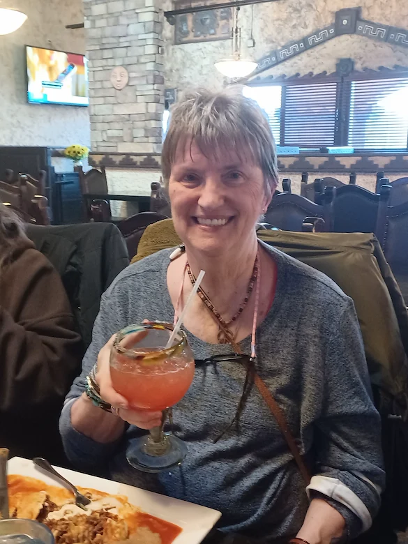 American House Dearborn Heights, senior living community offering independent living and respite care in Dearborn Heights, MI, resident enjoying a drink
