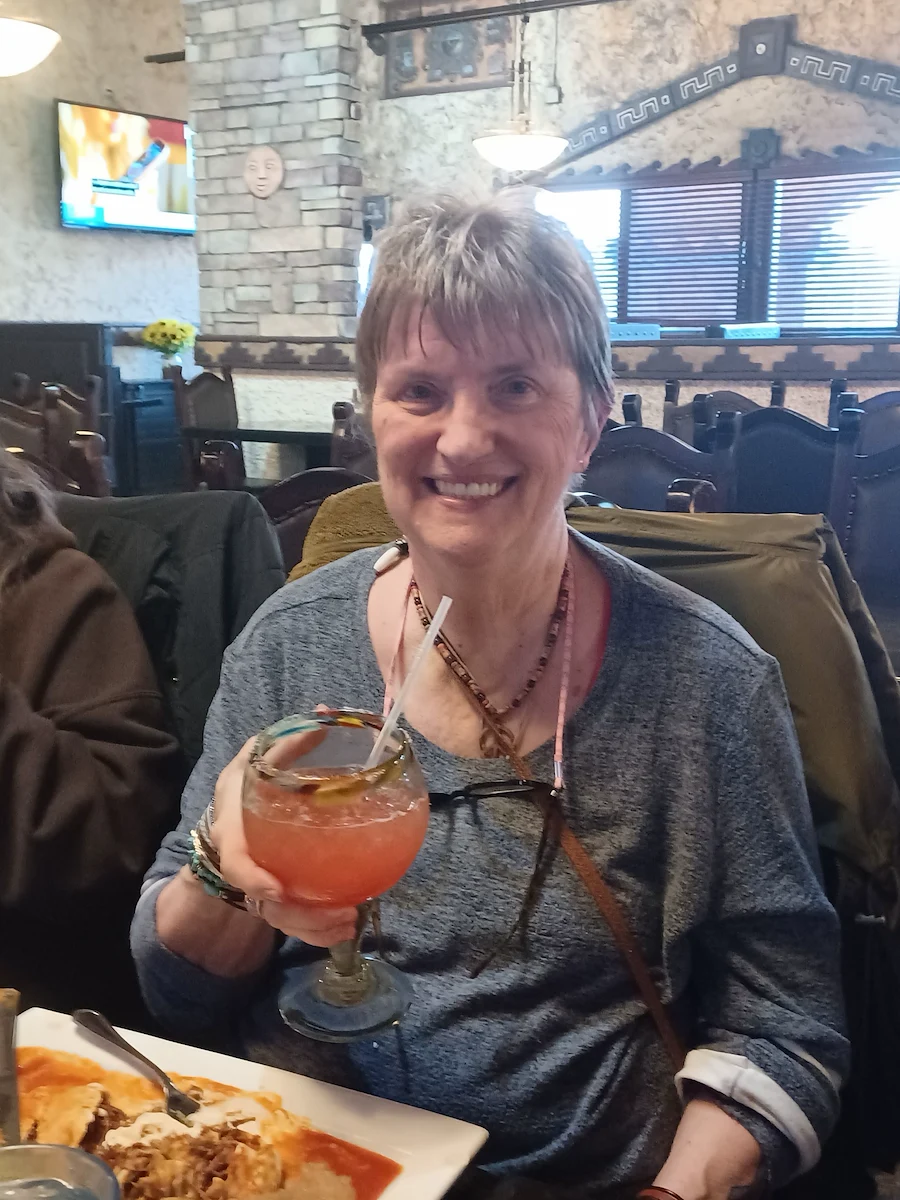 American House Dearborn Heights, senior living community offering independent living and respite care in Dearborn Heights, MI, resident enjoying a drink