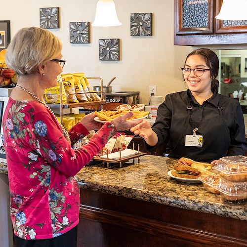 Rosewood Senior Living in Bakersfield, CA, resident receiving great dining service