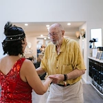 Chateau Pacific Lynnwood, WA, resident dancing during a fun community celebration