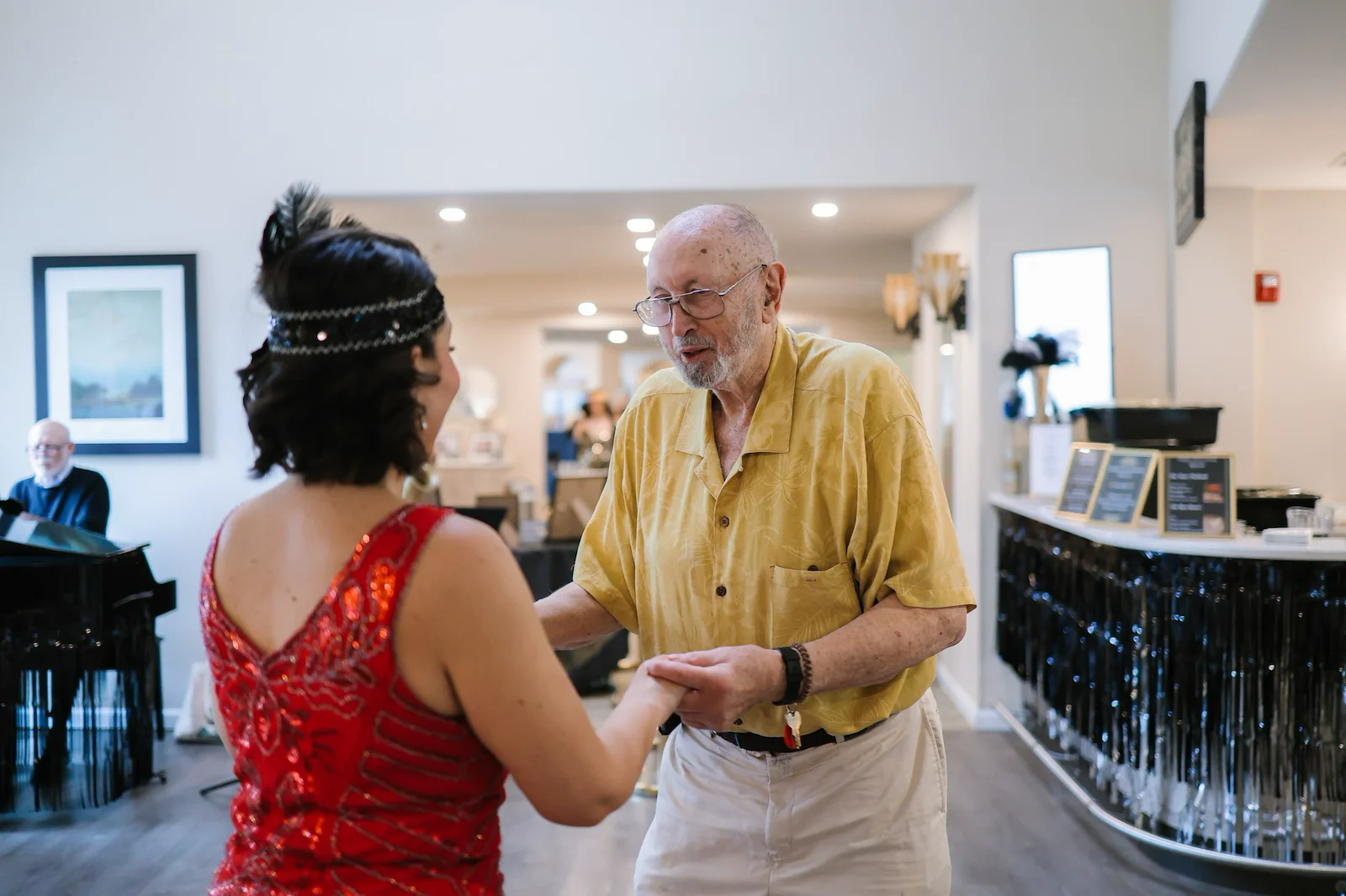 Chateau Pacific Lynnwood, WA, resident dancing during a fun community celebration