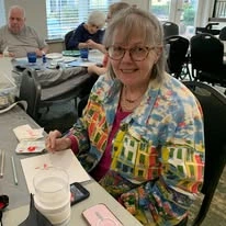 Whispering Pines Gracious Retirement Living Hawthorn Senior Independent Living in Raleigh, North Carolina resident painting