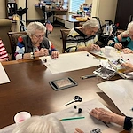 Charter Senior Living of Bowling Green resident activity - painting