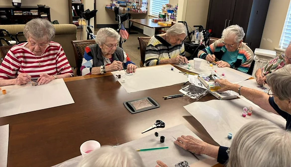 Charter Senior Living of Bowling Green resident activity - painting