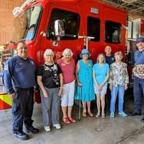 The Peaks At Santa Rita Active Retirement Living Hawthorn Senior Independent Living in Green Valley, Arizona residents in front of a fire truck