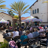 Covenant Living at Mount Miguel in Spring Valley, CA, residents enjoy entertainment outside