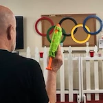Meadowlark Estates Gracious Retirement Living Hawthorn Senior Independent Living in Lawrence, Kansas residents playing a competitive water gun game