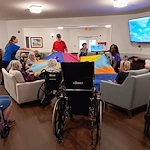 The Glenwood of Gainesville, Florida, residents staying active during an engaging parachute activity