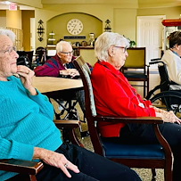 Charter Memory Care of Moline residents enjoy entertainment
