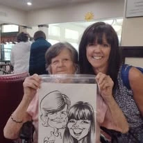 Stoneridge Gracious Retirement Living Hawthorn Senior Independent Living in Cary, North Carolina resident holding a drawing