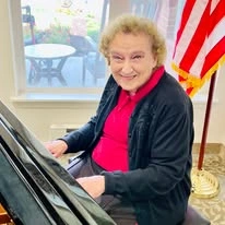 Hessler Heights Gracious Retirement Living Hawthorn Senior Independent Living in Leesburg, Virginia resident playing piano