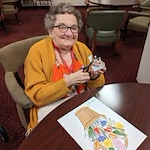 Scholl Canyon Estates Gracious Retirement Living Hawthorn Senior Independent Living in Glendale, California resident doing arts and crafts
