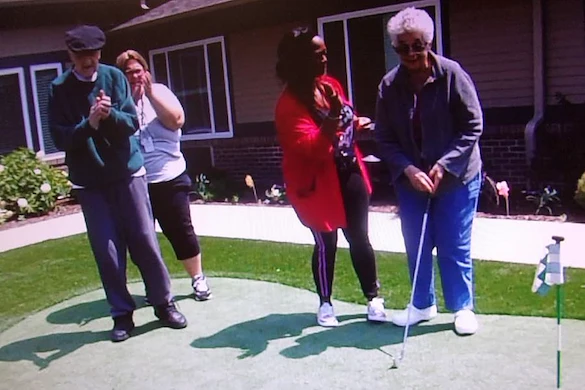 Porter Place Assisted Senior Living Memory Care in Tinley Park, IL residents playing mini golf, or putt putt