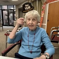 Ascension Living Resurrection Village Senior Living in Chicago, Illinois resident at a New Years party