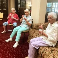 Willow Creek Gracious Retirement Living Hawthorn Senior Independent Living in Chesapeake, Virginia residents eating ice cream