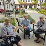 The Blake at LPGA residents celebrating Earth Day with drinks in their outdoor space