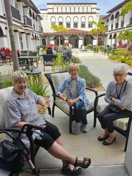 The Blake at LPGA residents celebrating Earth Day with drinks in their outdoor space