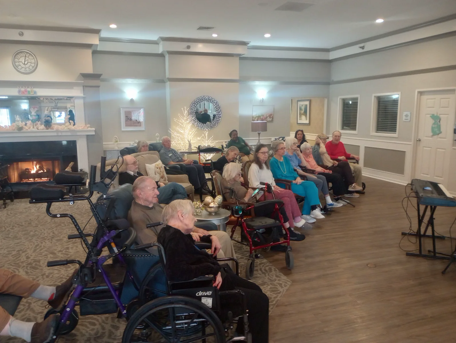 American House Sterling Heights, senior living community offering independent living and respite care in Sterling Heights, MI, residents watching a show