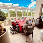 KindCare at Bristol, CT, residents enjoy socializing outside
