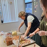 pizza night at Parkrose Chateau Gracious Retirement Living Hawthorn Senior Independent Living in Portland, Oregon