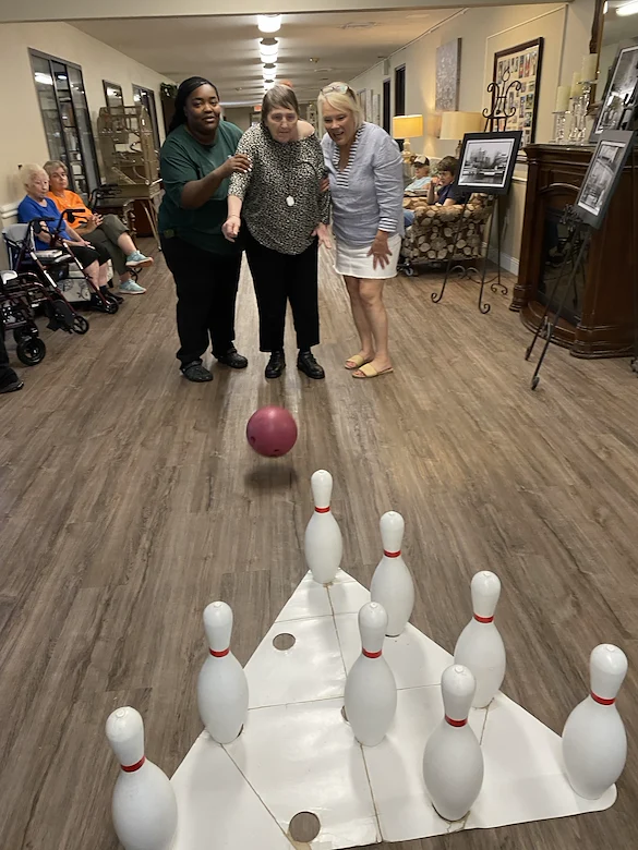 American House Stone senior living community offering independent living and respite care in Rochester Hills, MI, residents bowling