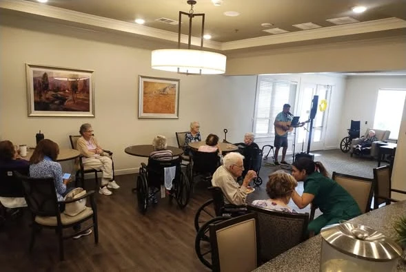 The Lodge at Pine Creek Senior Living residents enjoying some music therapy
