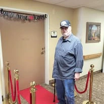 Gilman Grove Assisted Senior Living in Oregon City, Oregon resident on the welcome home red carpet