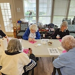 Charter Senior Living of Gallatin, Tennessee, residents doing crafts together