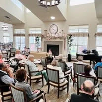 Hessler Heights Gracious Retirement Living Hawthorn Senior Independent Living in Leesburg, Virginia residents gathered in the living room