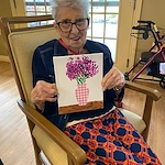 Pomeroy Living Rochester resident smiling after activity