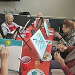 Charter Senior Living of Bowie resident activity - painting