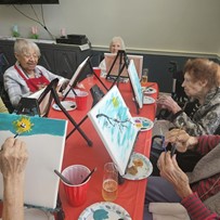 Charter Senior Living of Bowie resident activity - painting