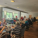Charter Senior Living of Fredericksburg, Virginia, residents enjoying wonderful dining together