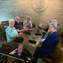The Lodge at Wake Forest Gracious Retirement Living Hawthorn Senior Independent Living in Wake Forest, North Carolina residents at a restaurant