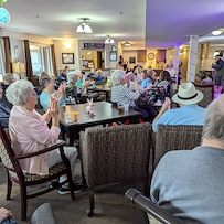 Park Vista Retirement Living North Hill East Moline, IL, residents enjoy entertainment