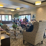 The Village at Keizer Ridge Assisted Living and Memory Care residents enjoy others' company and socializing