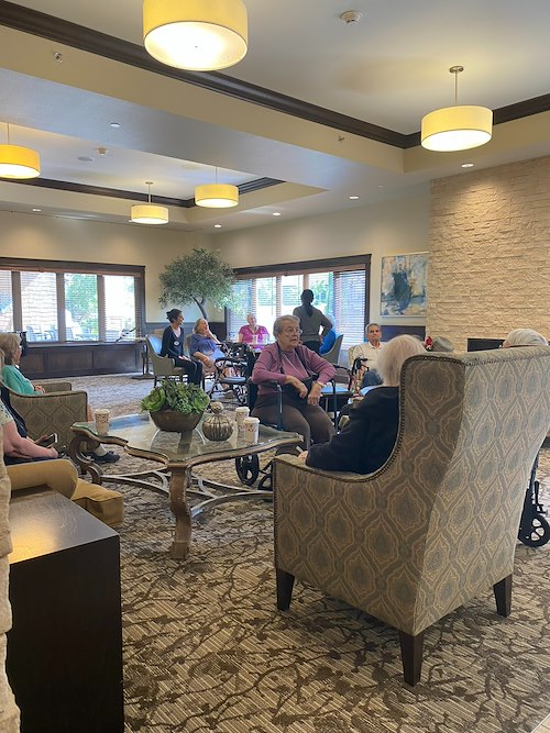 The Village at Keizer Ridge Assisted Living and Memory Care residents enjoy others' company and socializing