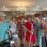 Calumet Trace - a Charter Senior Living Community residents having fun celebrating the Kentucky Derby